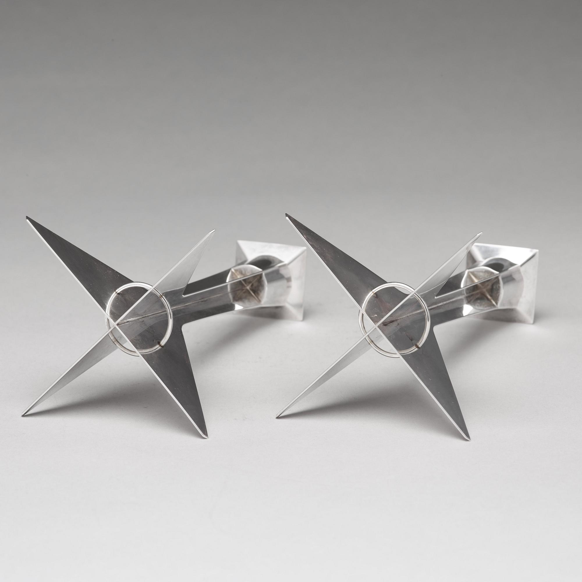 Hubert Hydman, a pair of sterling candlesticks, Stockholm 1988.