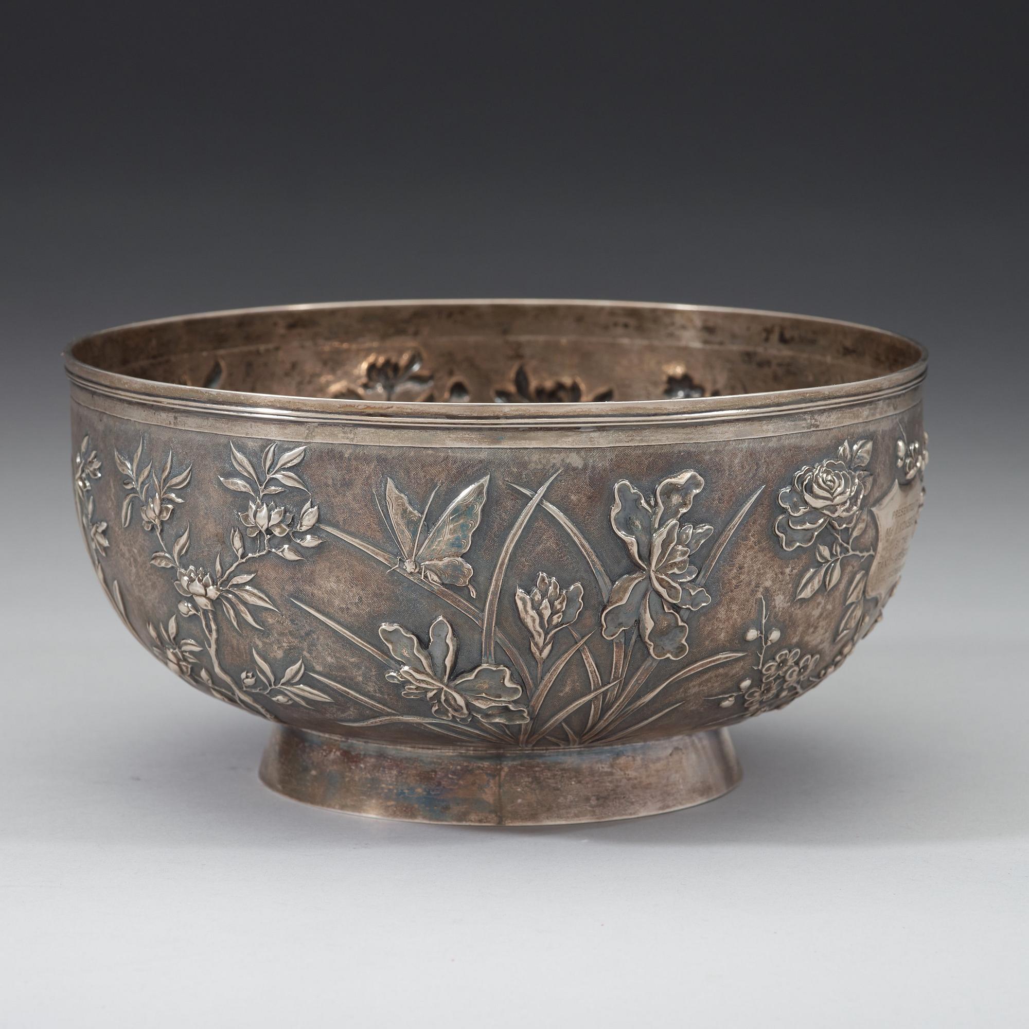 An export silver bowl, Shanghai, bears marks Shanghai Woshing, circa 1910.