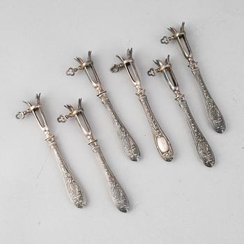 A set of six French 19th century silver bone-holders.