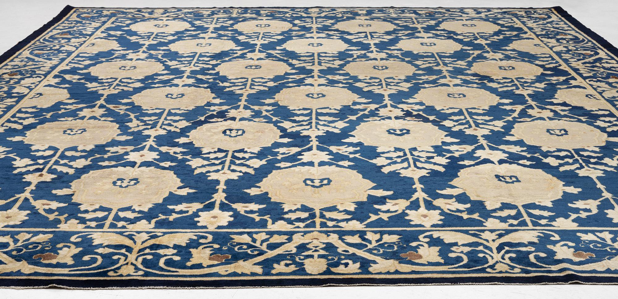 An antique Peking carpet, north China, c. 438 x 373 cm.