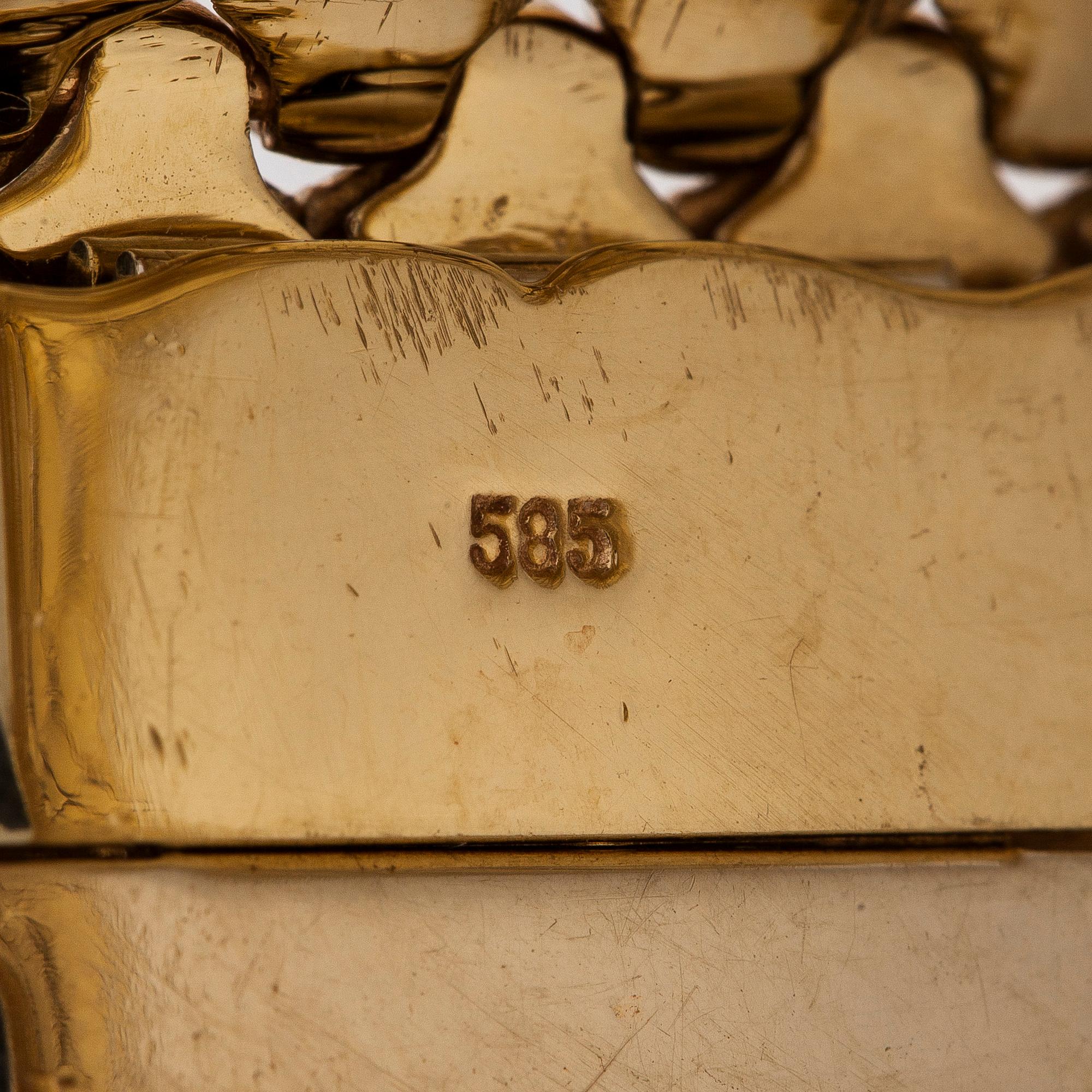 Armband i 14K trefärgsguld.