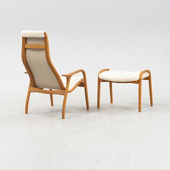 Yngve Ekström, a 'Lamino' armchair and a foot stool, Swedese, 2002.