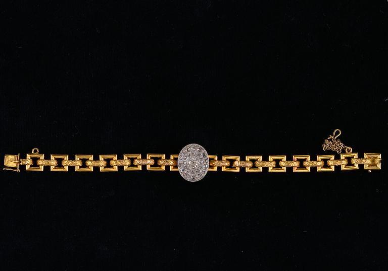RANNEKORU, 56 kultaa vanhahiottuja timantteja n. 2.65 ct. Pietari 1898 - 1903. Paino 23,6 g.