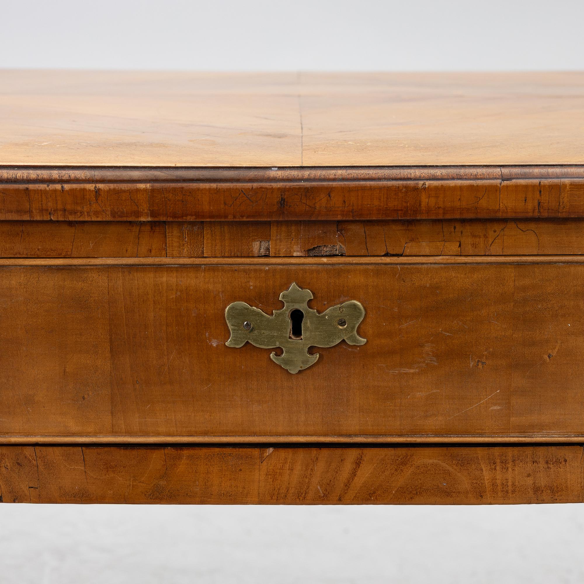 A George II walnut partner's desk, mid 18th century.