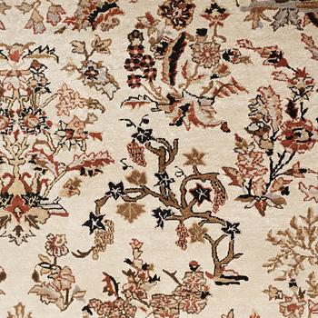 A chinese slik carpet, around 254 x 154 cm.