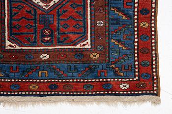 An antique Kurdish runner, probably,. 406 x 105 cm.