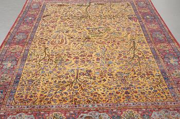 A carpet, a semi-antique silk Kashan figural, ca 309-310 x 204,5-207 cm.