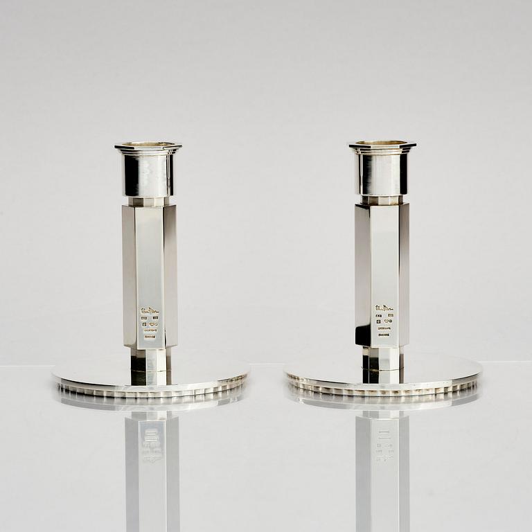 Wiwen Nilsson, a pair of sterling silver candlesticks, Lund, Sweden 11957 and 1960.