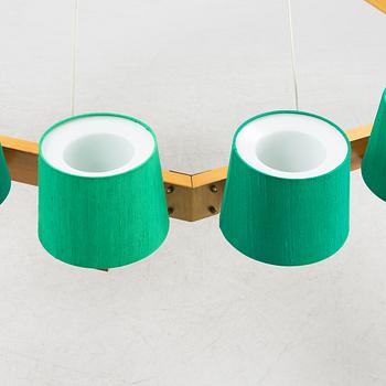 A pine 16-light chandelier, Luxus, Vittsjö.