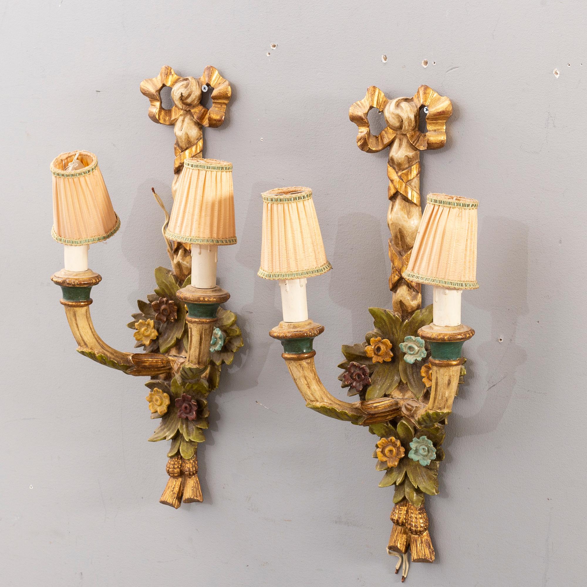 A pair mid 20th century wooden wall lamps from Paoletti, Firenze Italy.