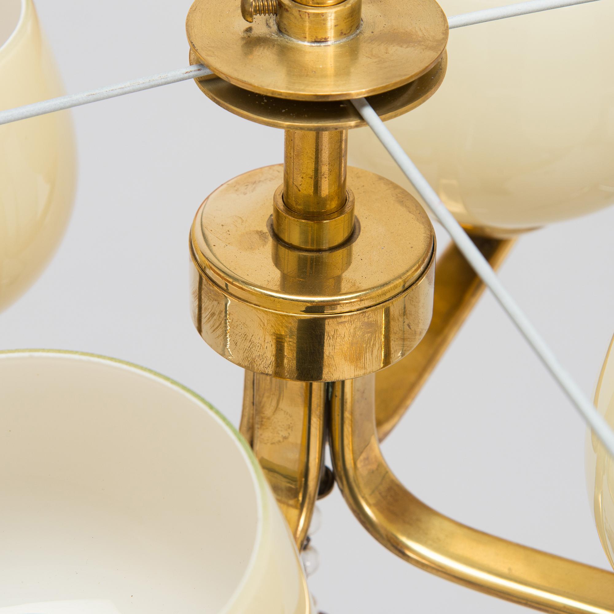 Paavo Tynell, kattovalaisin, malli 1359/4 Taito 1900-luvun puoliväli.