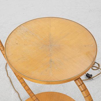 A 1930's/40's floor lamp with table.