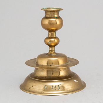 A 17th century Baroque bronze candlestick.