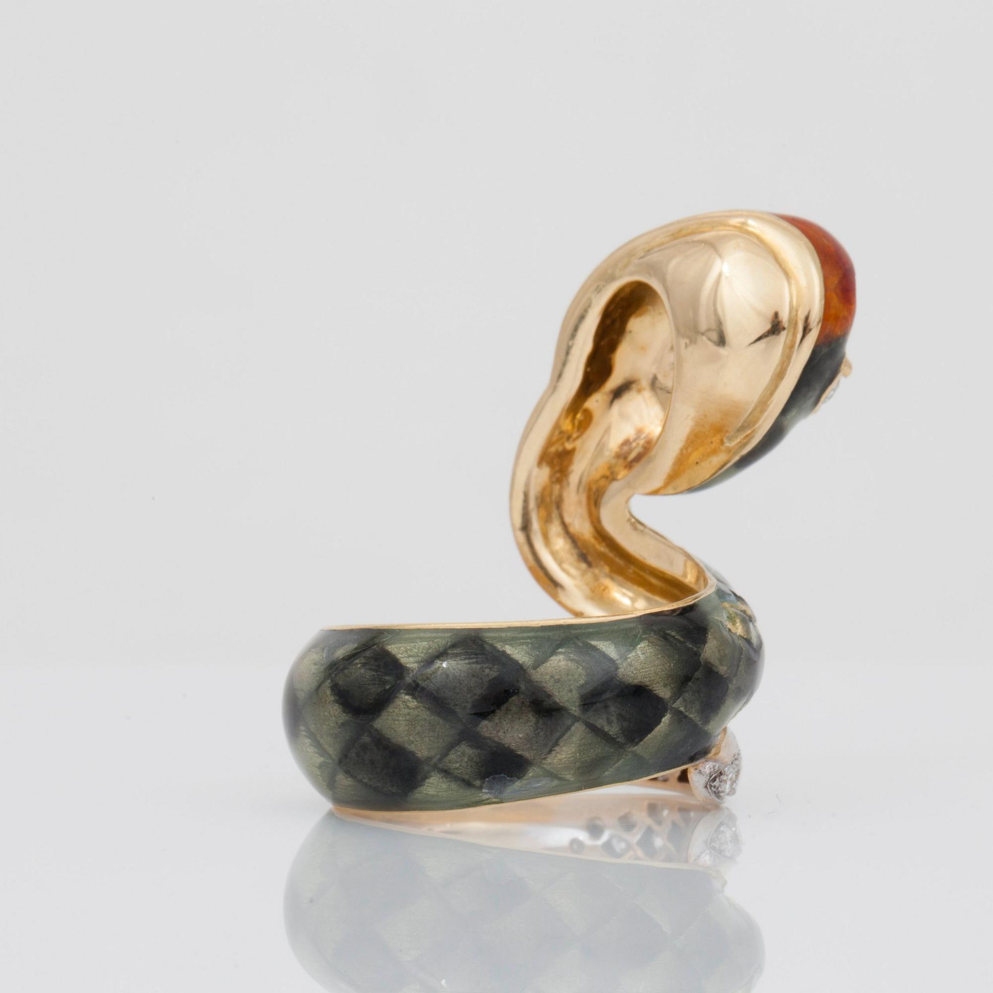 An enamel and brilliant-cut diamond snake ring.