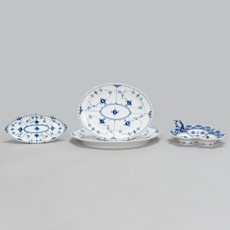 A 39-piece porcelain coffee set, 'Musselmalet', mostly full lace, Royal Copenhagen, Denmark.