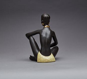 FIGURIN, etikettmärkt Goldscheider.