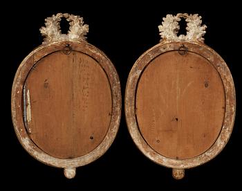 A pair of Gustavian late 18th century girandole mirrors by Johan Åkerblad, master 1758.