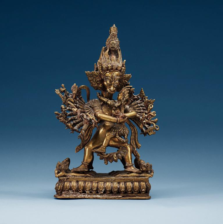 A Tibetian bronze figure, 19th Century.