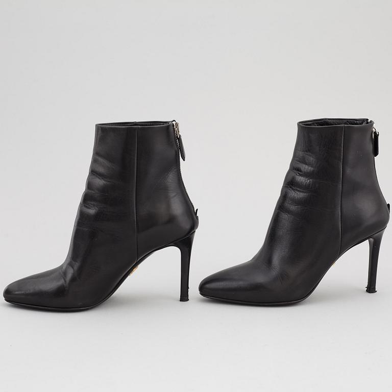 PRADA, a pair of black leather boots, size 35.