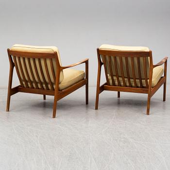 A pair of USA-75 easy chairs by Folke Ohlsson, DUX.