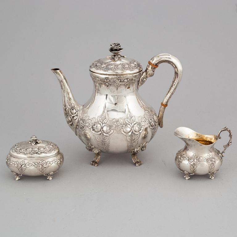 A silver coffee pot, creamer and sugar box. Swedish import mark.