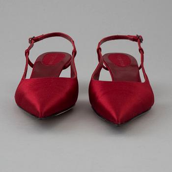 Red silk slingbacks by Sergio Rossi.