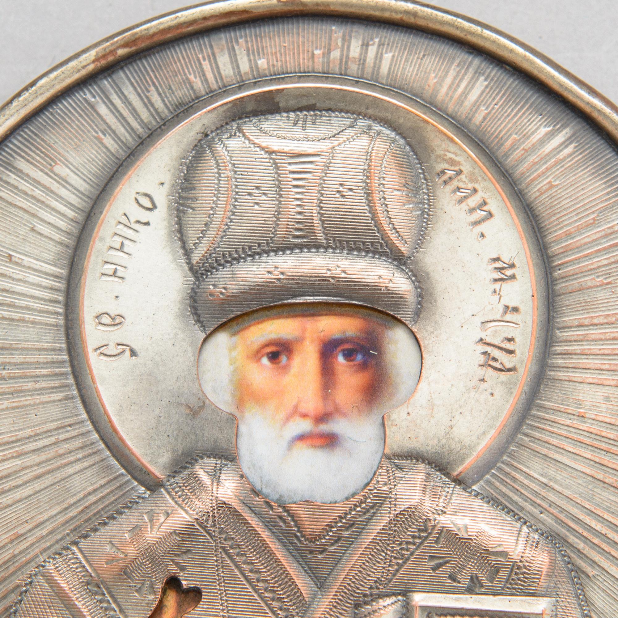 Three early 20th-century Russian travelling icons.