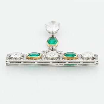 An impressive platinum, step-cut emerald and old-cut diamond brooch by W.A. Bolin likely Moscow 1912-1917. No hallmarks.