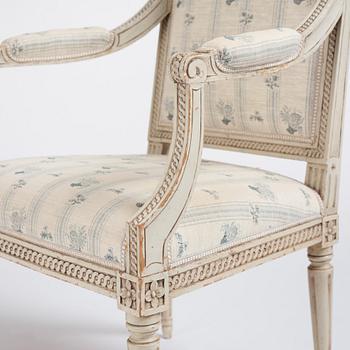 A pair of Gustavian open armchairs by J. Lindgren (master in Stockholm 1770-1800).