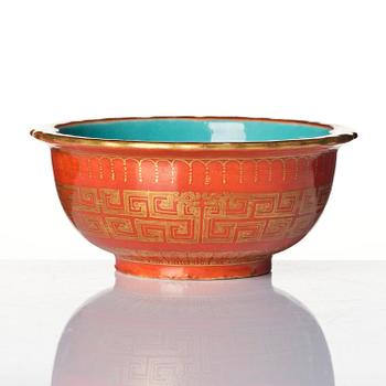 A coral red ground and gilt decorated turquoise enamelled bowl, Qing dynasty, Daoguang mark and period (1821-50).