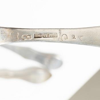 Three Swedish silver tablespoons with fiddle-pattern handles, circa 1800.