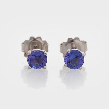 A pair of 18K white gold earrings with tanzanites.