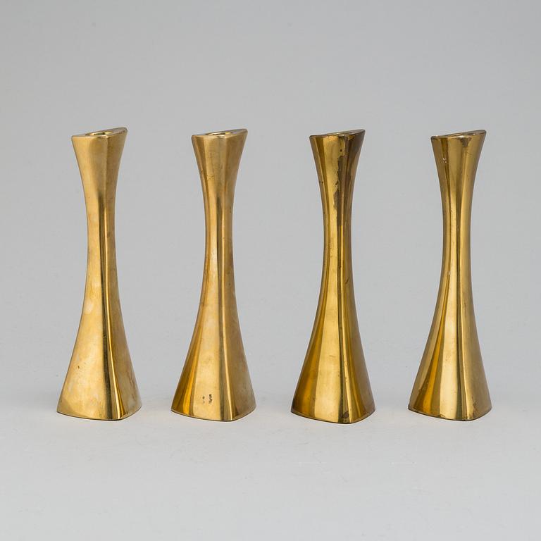 Four brass candle sticks by Karl Erik Ytterberg, 1960's.