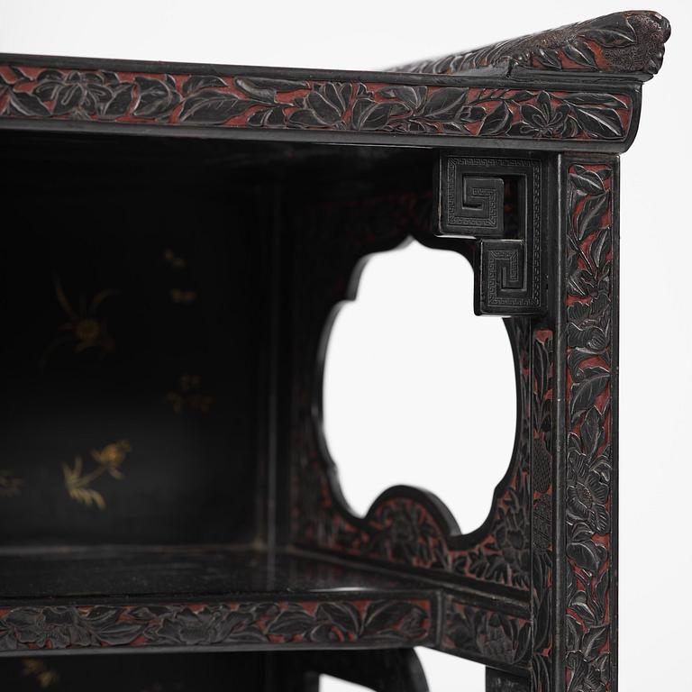 A lacquer display cabinet, late 19th century.