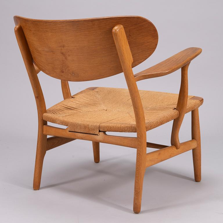 Hans J. Wegner, Fåtölj, modell CH 22, Carl Hansen & Sons, Odense.