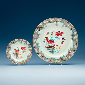 A famille rose serving dish and six dinner plates, Qing dynasty, Qianlong (1736-95).