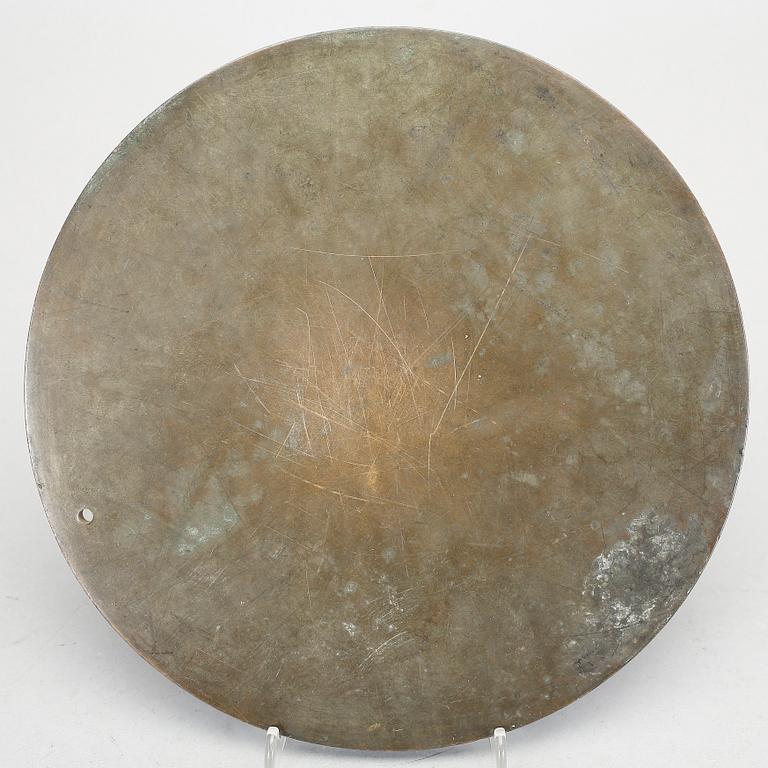 A bronze mirror marked 'feng xin fu zao' (made by Feng Xinfu), Ming Dynasty, 17th Century.