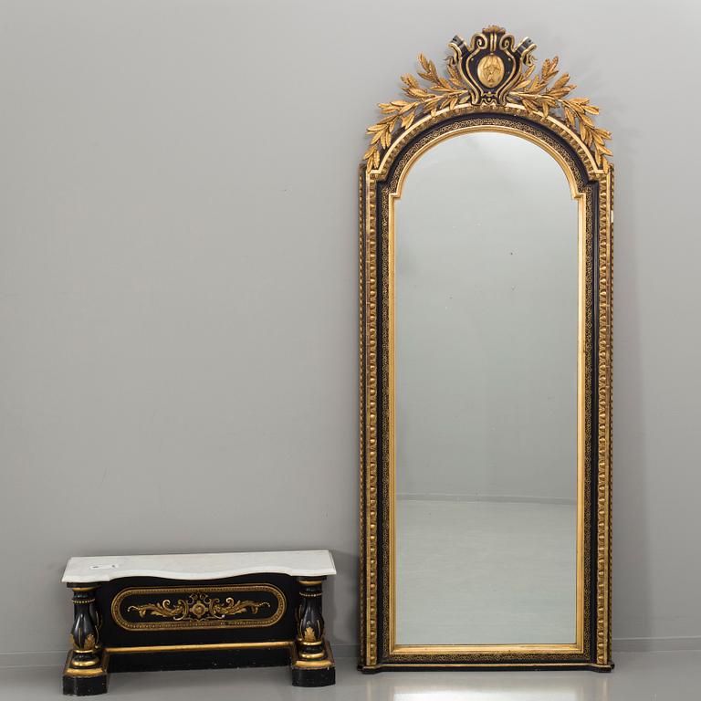 A 19th century mirror with wall table.