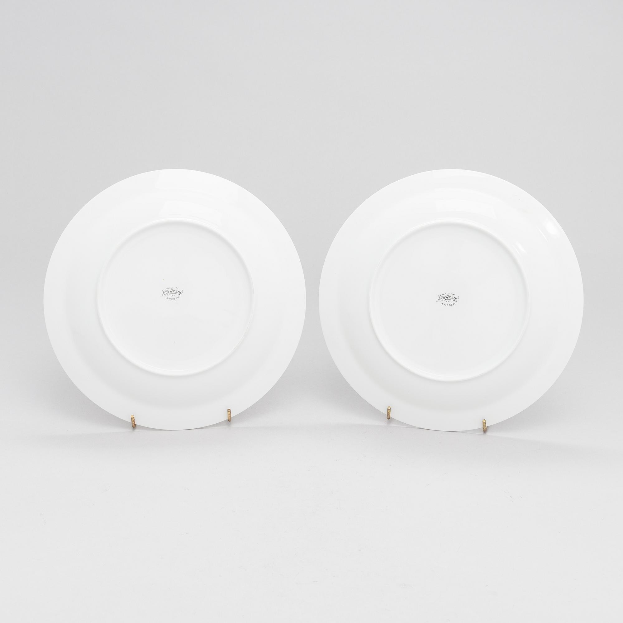 A 25-piece porcelain fish dinnerware set for Rörstrand.