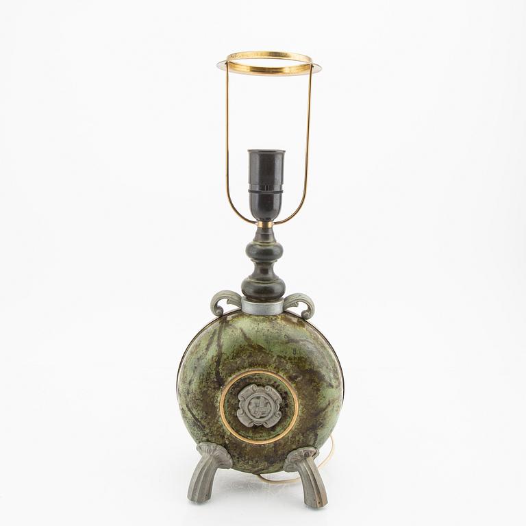 A 1940s metal table lamp.