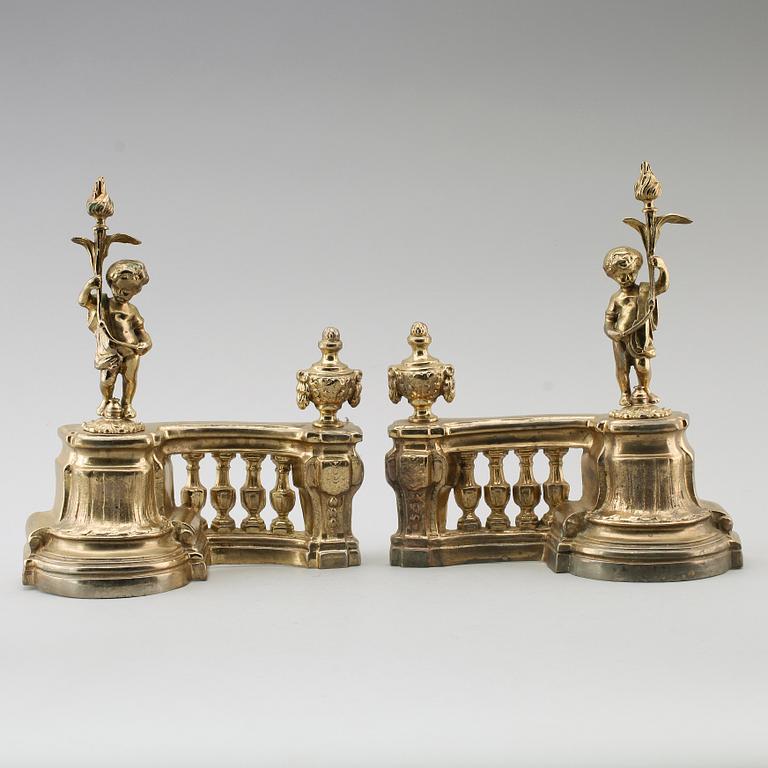 ELDHUNDAR, 1 par, förgylld metall, England, 1900-/2000-tal.