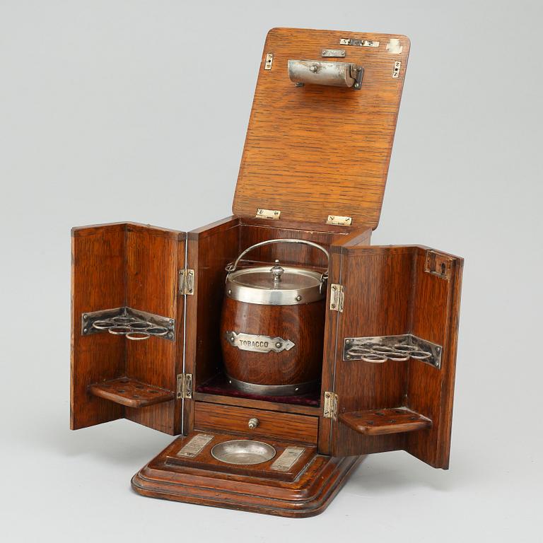 A small tobacco cabinet by BW & Co, early 20th century.