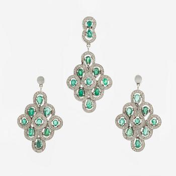 Earrings, a pair, and a pendant in white gold with emeralds and brilliant-cut diamonds.