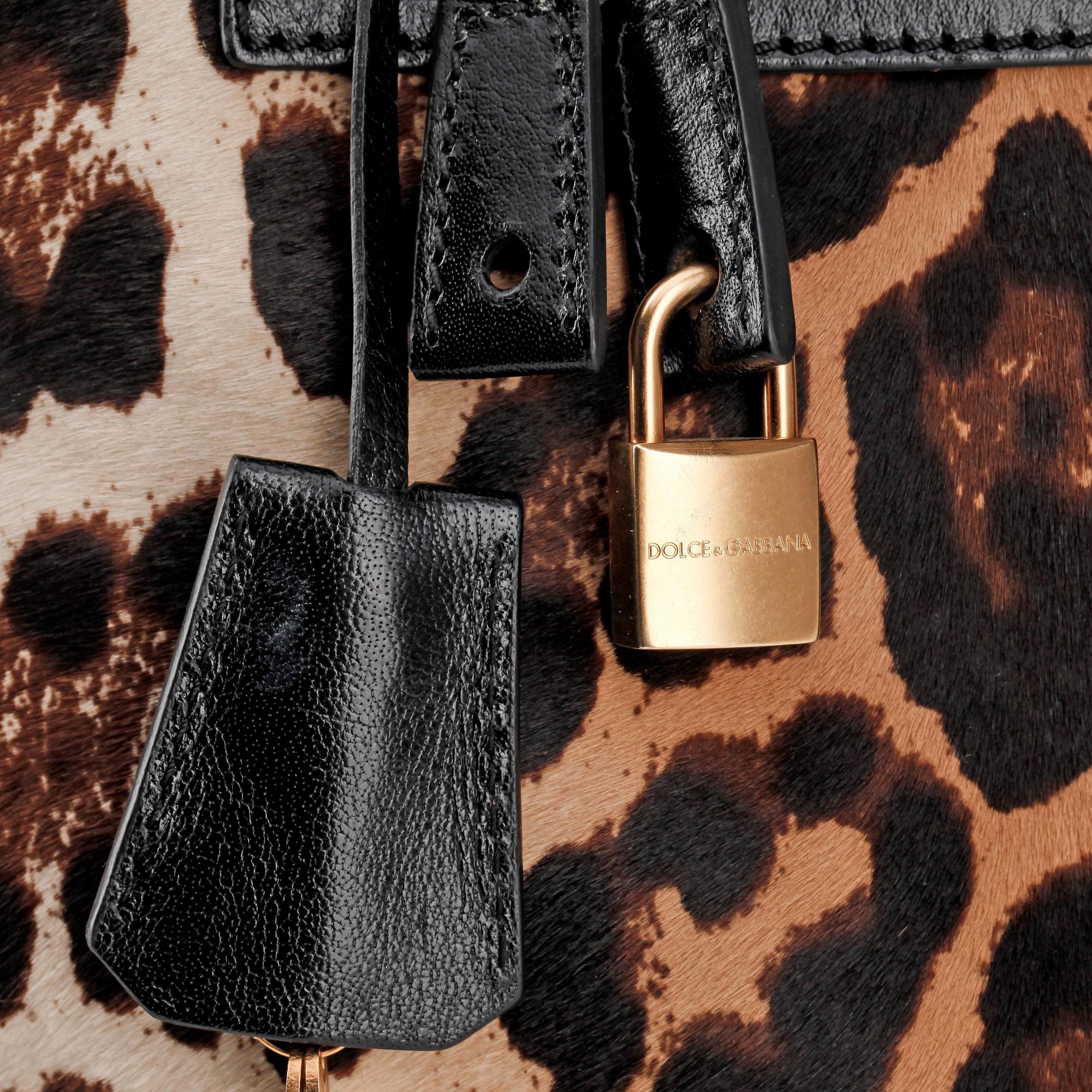 DOLCE & GABBANA, a leopard patterned handbag.