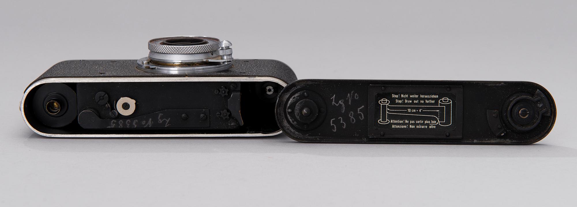 A black body Leica camera no 296865 with a Elmar lens made in 1938