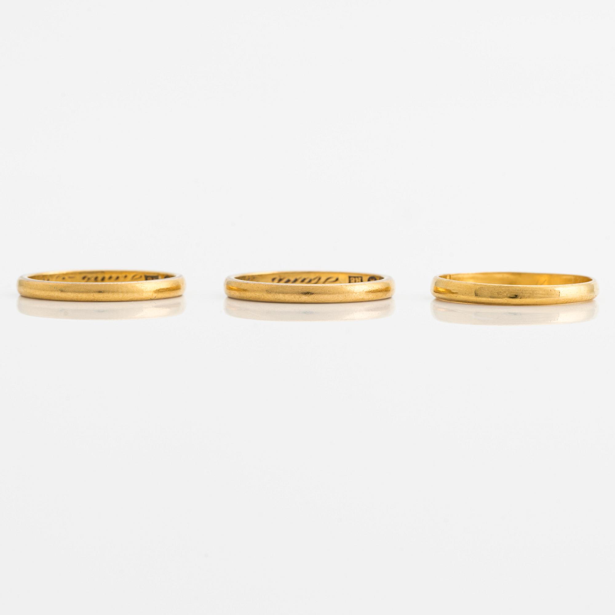 Ringar, 3 st, släta, 23K guld.