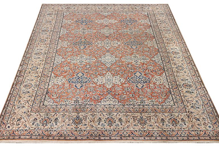 A semi-antique/old Nain carpet, part silk, c. 343 x 230 cm.