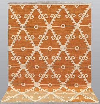 A Kelim rug, c. 251 x 171 cm.