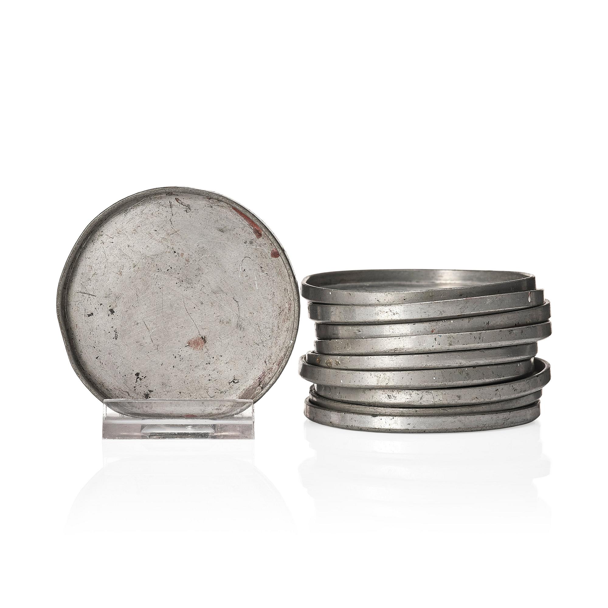 Firma Svenskt Tenn, a set of 10 pewter glass coasters, Svenskt Tenn Sweden 1934 ( 2) and 1946. Alva & Gunnar Myrdal Collection.
