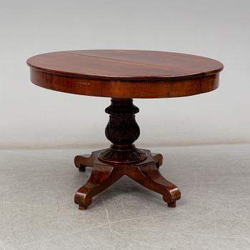 A late Empire Dinner table, 19th century.